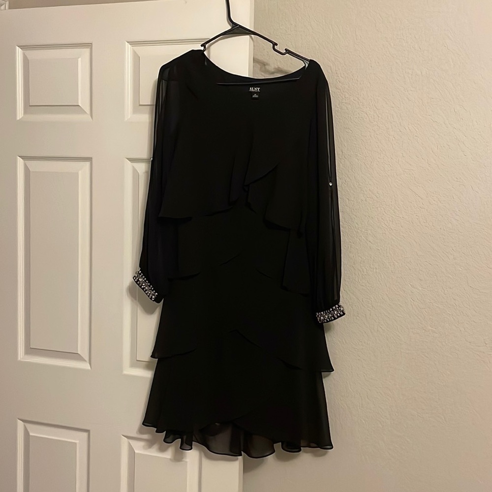 Knee length tiered dress with jeweled sleeves